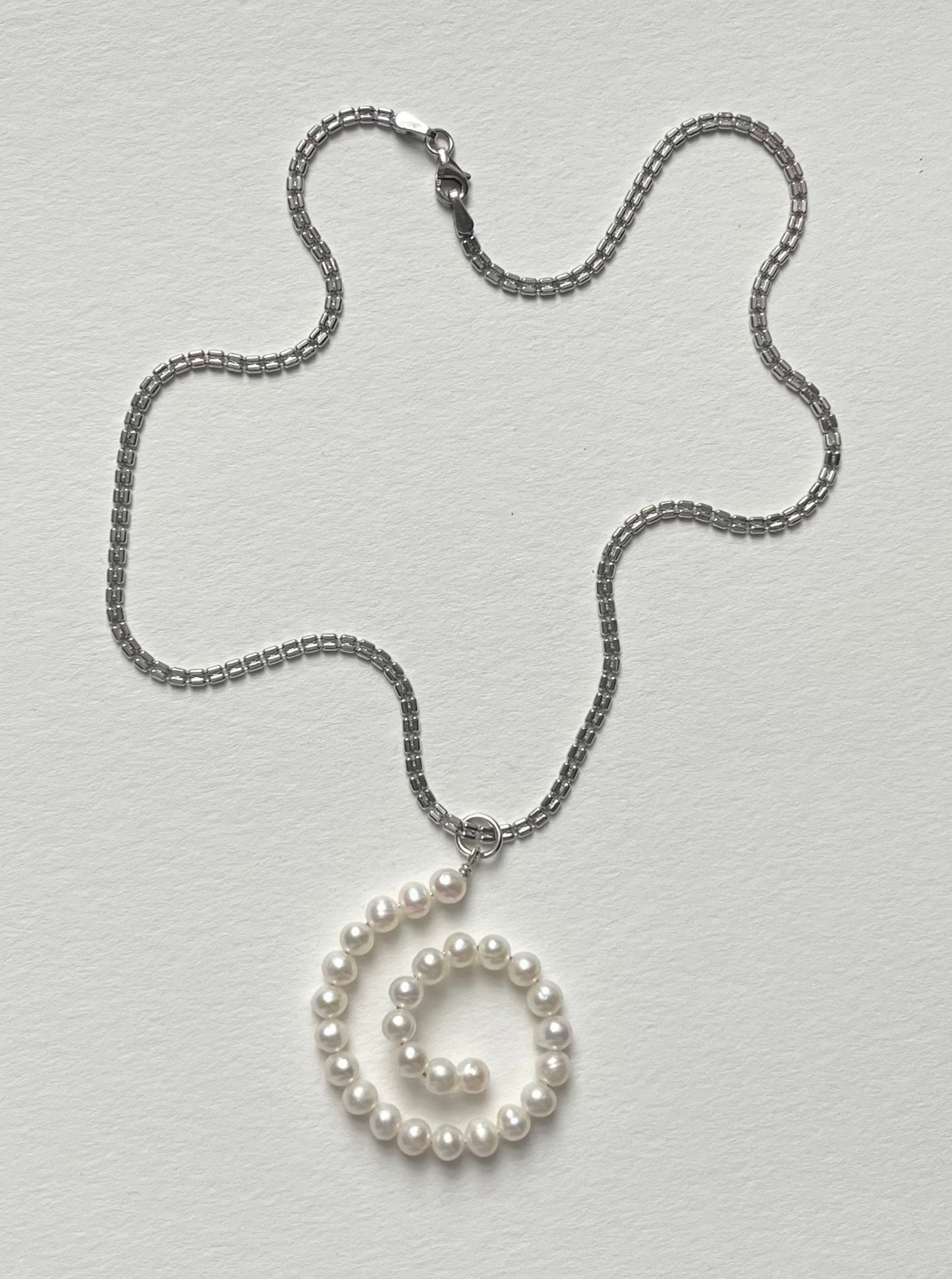 GLOBAL HEAT WAVE PEARL NECKLACE