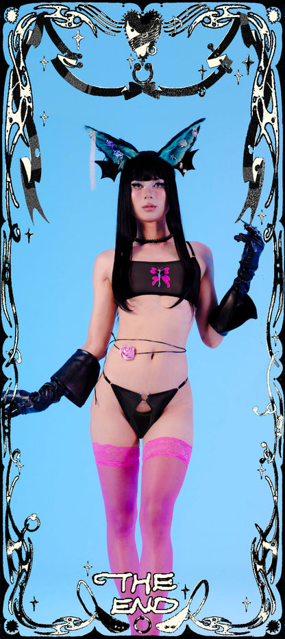 Person in cosplay outfit with decorative border and 'The End' text on a blue background