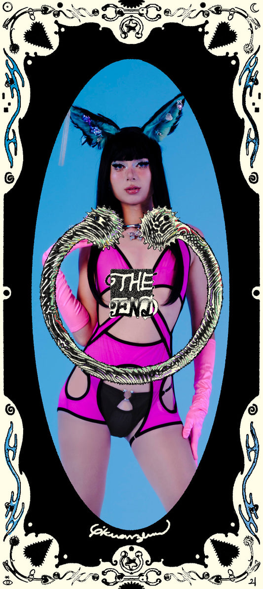 Person in a pink outfit with 'THE FEMI' text, surrounded by decorative elements on a blue background.